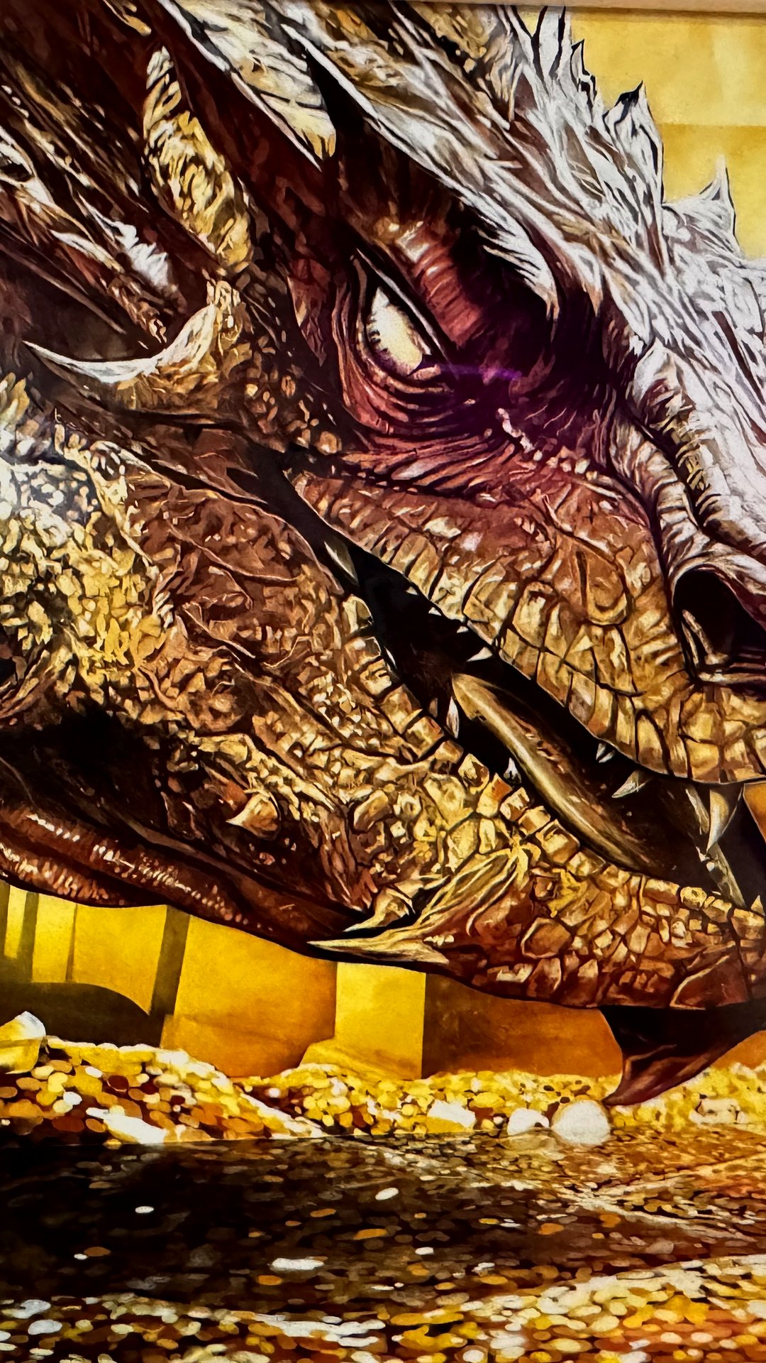 Visitor reaching out to a giant painted dragon at Museum of Illusions Barcelona